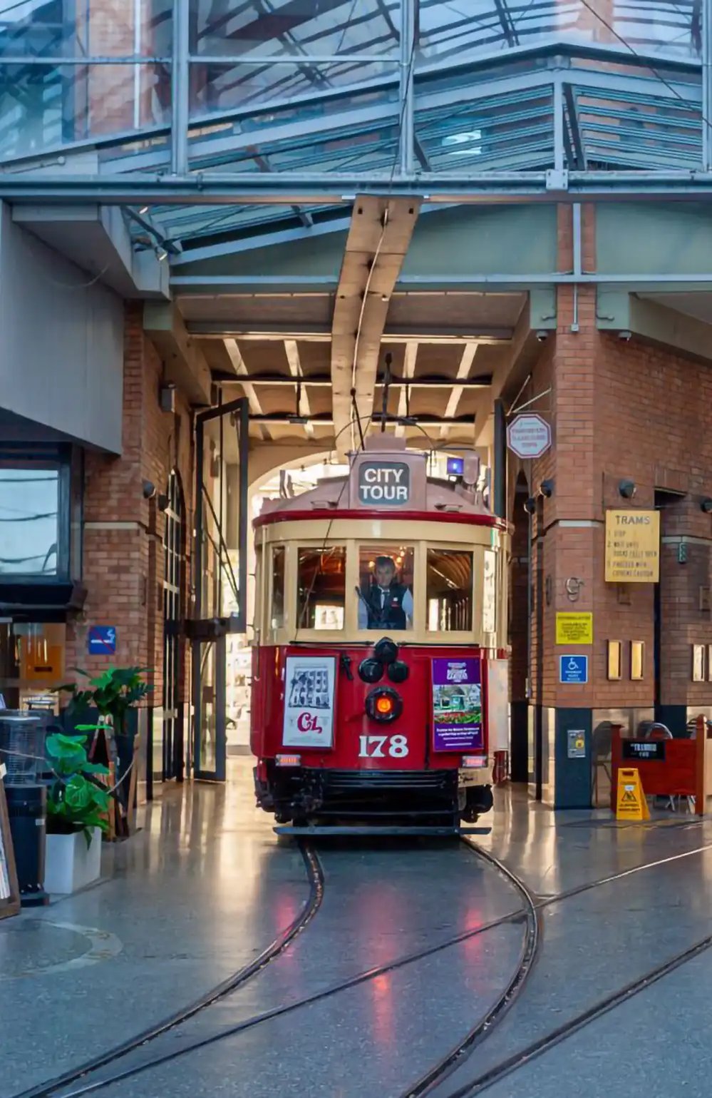 Christchurch City Tour Tram arriving at the Cathedral Junction tram stop in central Christchurch