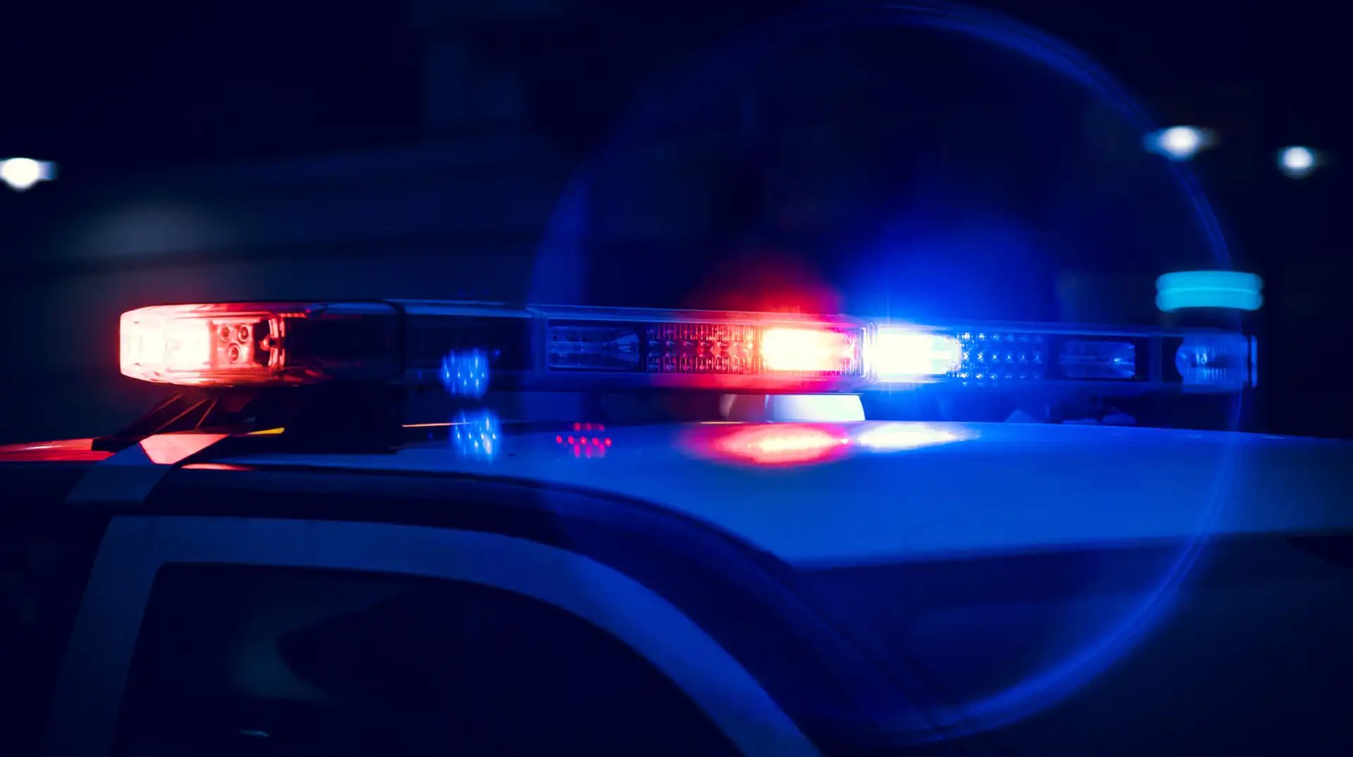 Close-up of emergency services vehicle lights, illustrating AI-supported decision-making in public safety operations